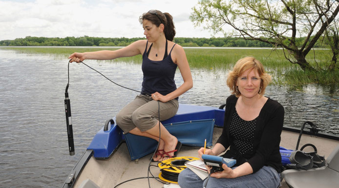 Hydrolab multi-meter probe above the water