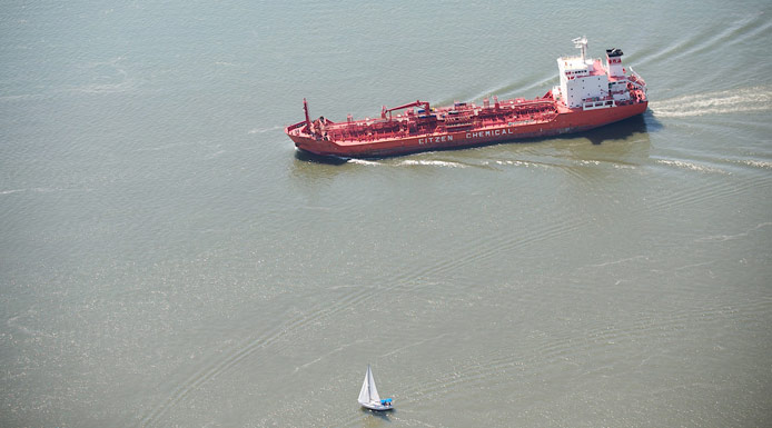 Red ship in the waterway